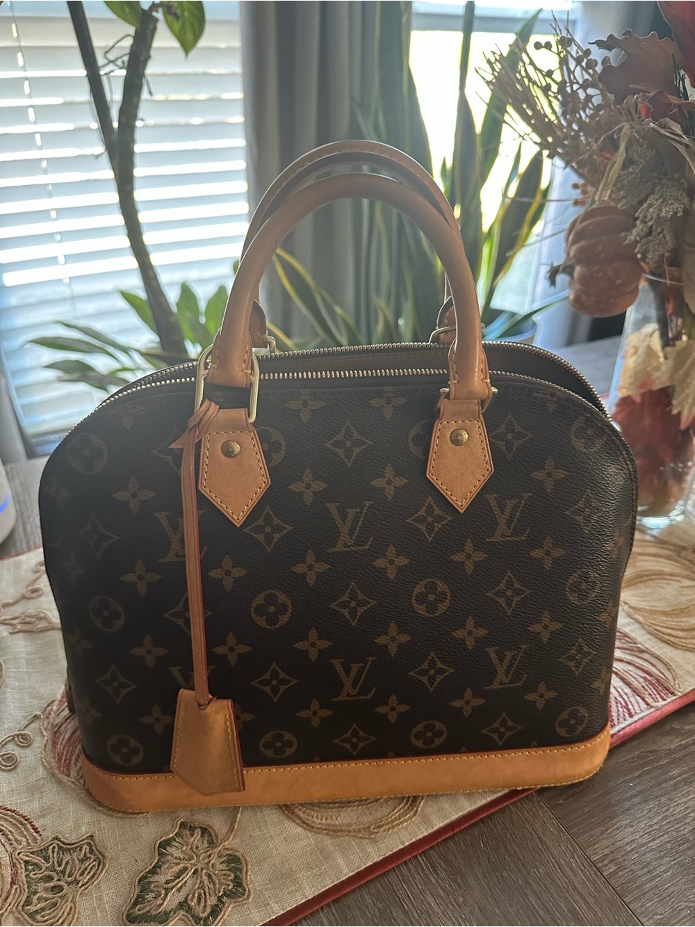 Louis Vuitton Brown Monogram Alma Satchel with Natural Trim